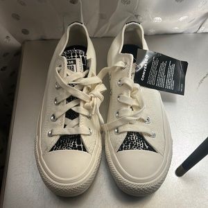 White/cream converse. Brand new, never been worn. Tags still attached.